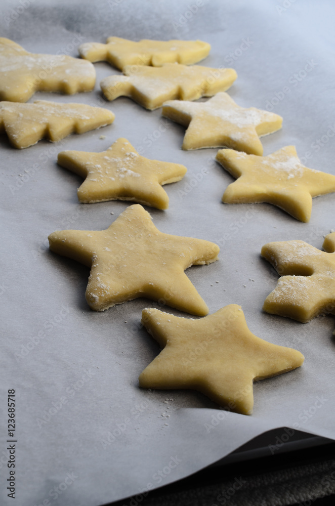 Christmas Biscuit Pastry Shapes on Baking Tray with Parchment