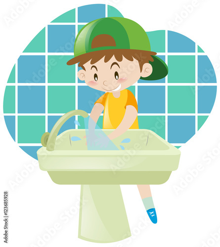 Little boy washing hands