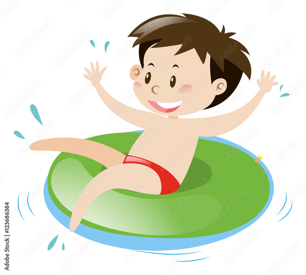 Little boy on green floating ring