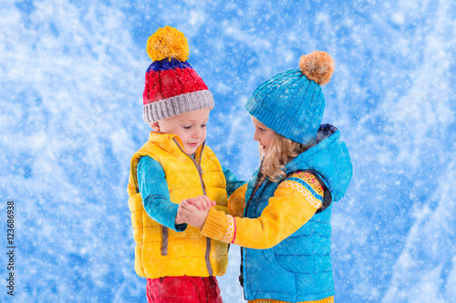 Kids playing outdoors in winter