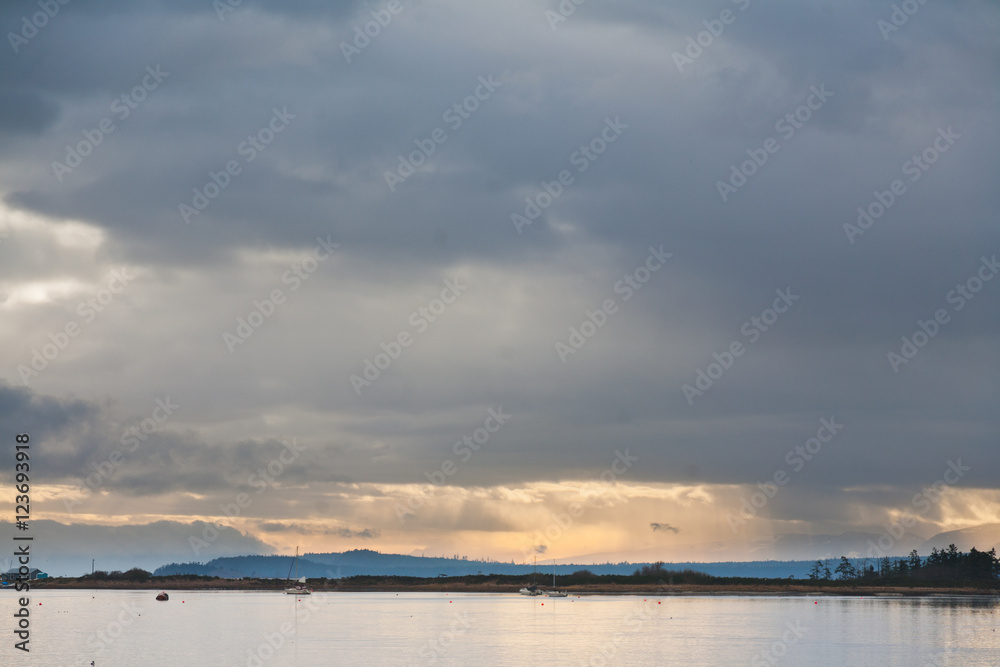 Dramatic storm clouds over harbour in Comox Valley