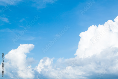 Sparse clouds in blue sky