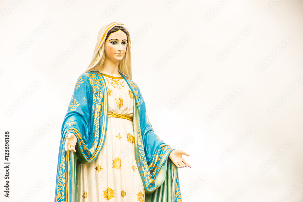 Statues of Holy Women on cloudy sky background