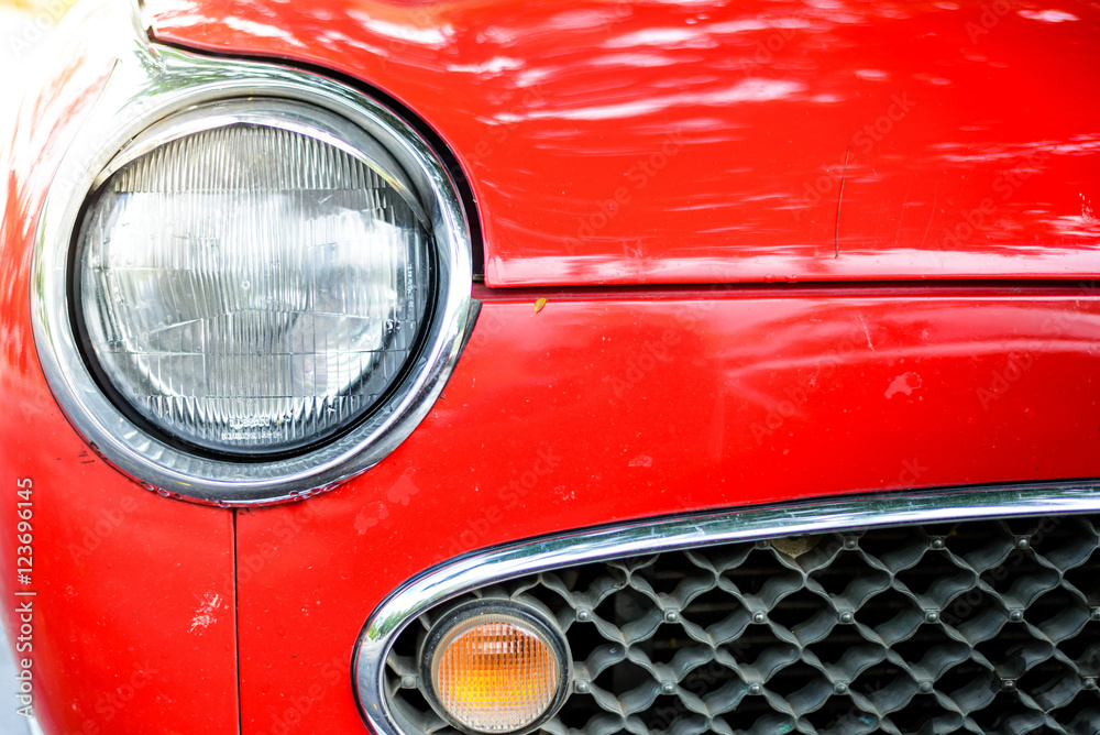 close up of a red vintage car