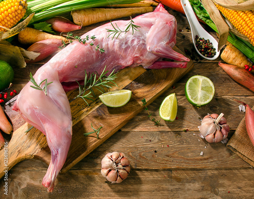 Raw whole rabbit with vegetables