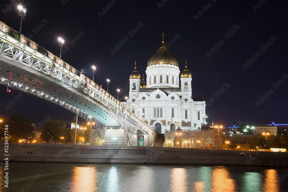 The Cathedral of Christ the Savior and Patriarch bridge in september night. Moscow, Russia