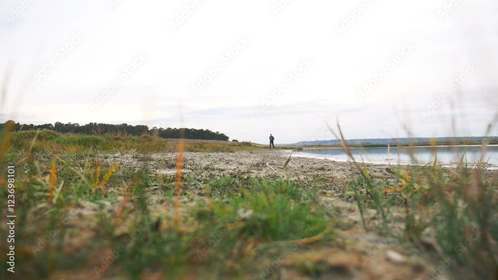 man athlete runs runner on nature sport near a lake healthy lifestyle man athlete runs runner on nature sport near a lake healthy lifestyle