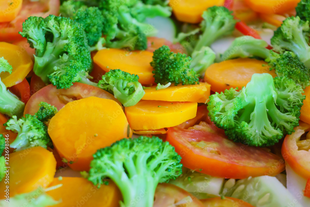 cooked vegetables: tomato, brocoli, carrot cooked vegetables: tomato, brocoli, carrot