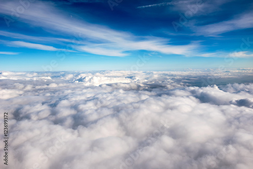 Fototapeta Naklejka Na Ścianę i Meble -  Blue sky above a layer of white clouds