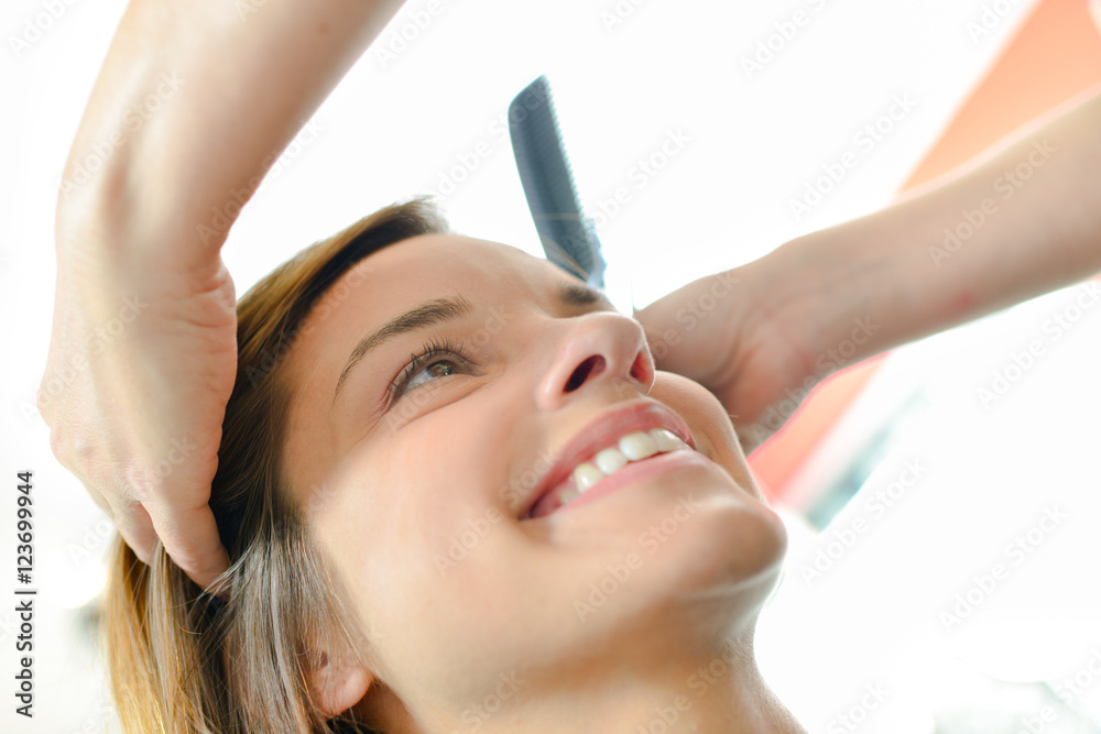 woman having haircut woman having haircut