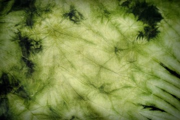 colorful green tie dye fabric pattern texture for background