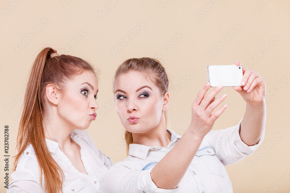 friends student girls taking self photo with smart phone friends student girls taking self photo with smart phone