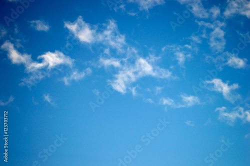 white fluffy clouds in the blue sky