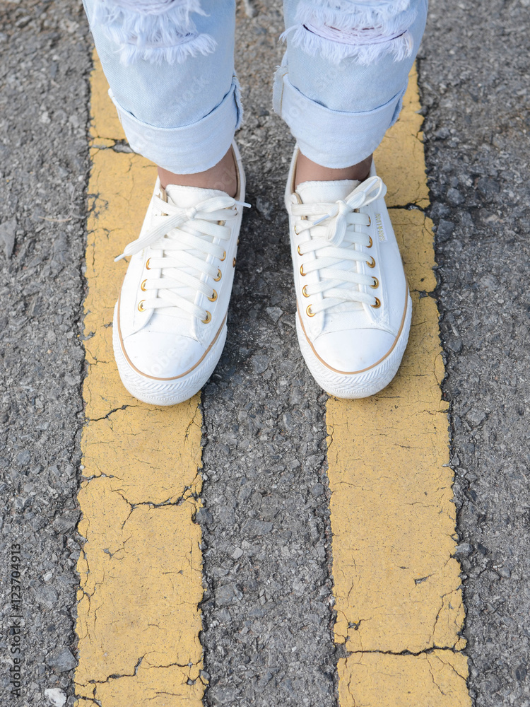 White casual shoes making decision