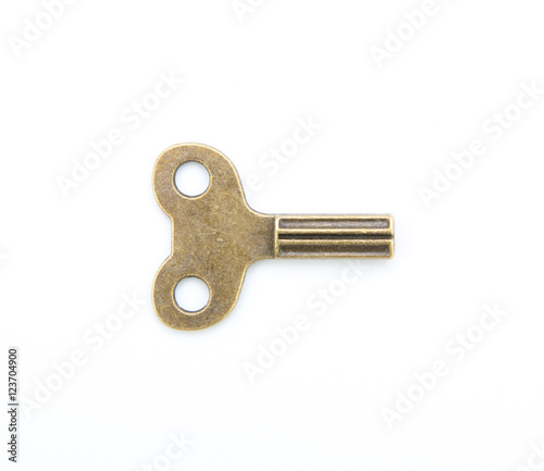 old clock key winder isolated