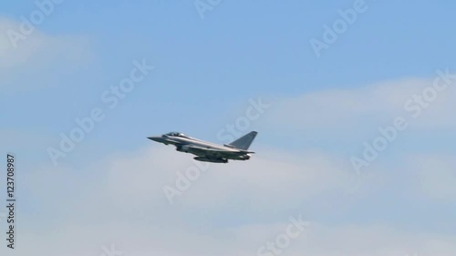 Slow motion display of a multi-role fighter combat aircraft at an air show photo