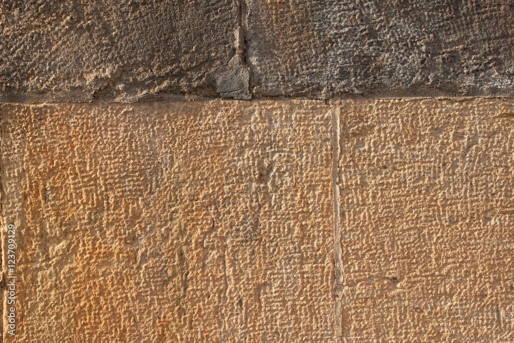 Fototapeta premium Historical wall of sandstone. Details of sand stone texture 