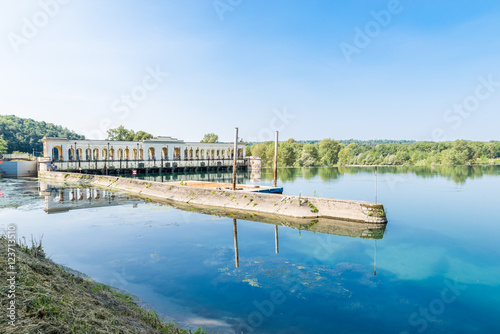 Ticino river at the dam of Panperduto, Somma Lombardo, province of Varese, Italy. To the left, the basin of navigation for the passage to Villoresi canal photo