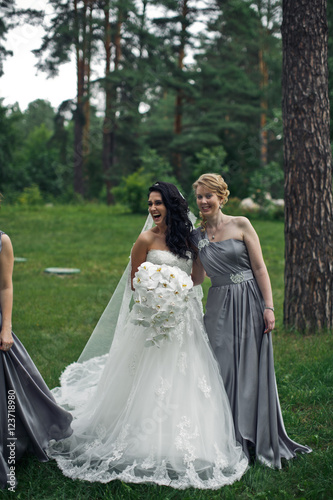 The happinest bride with bridesmaid
