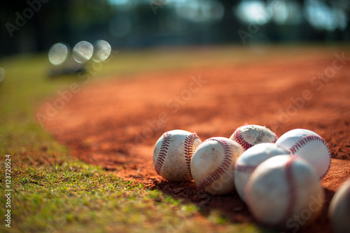 Fényképezés Close up of several old baseballs on infield boundary