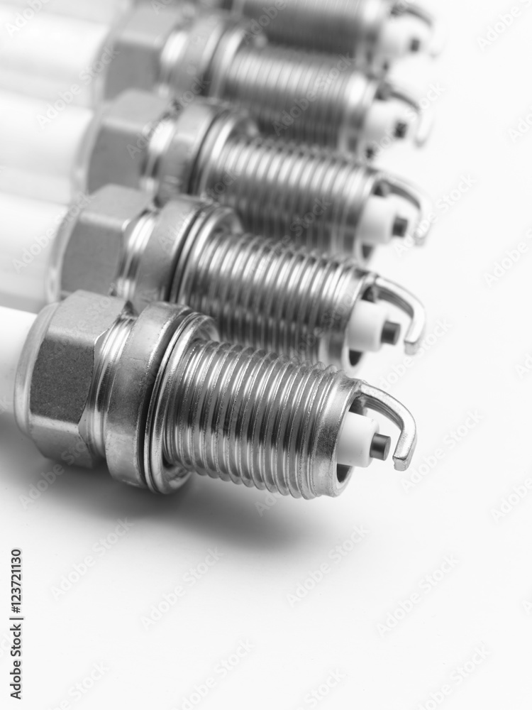 Spark plugs on white background. Spark plugs on white background.