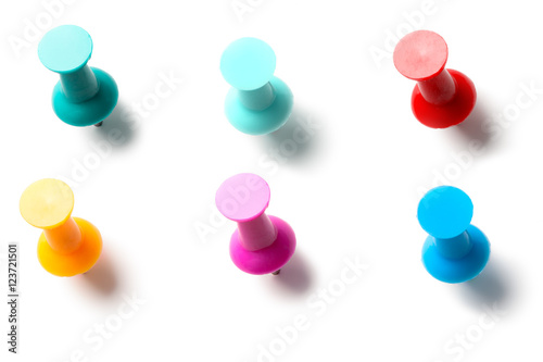 Colorful bulletin board pushpins thumbtacks isolated on white background