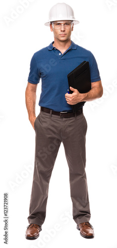 Causal Businessman Architect Engineer in blue polo shirt with Notebook on White
