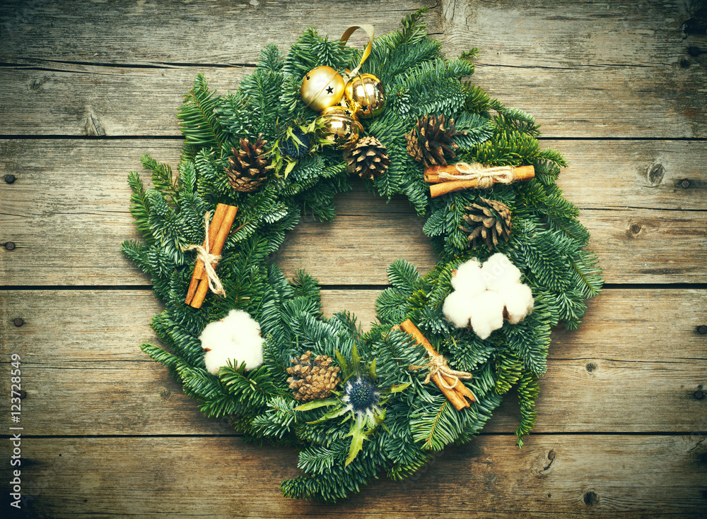 Christmas wreath on the wooden background Christmas wreath on the wooden background