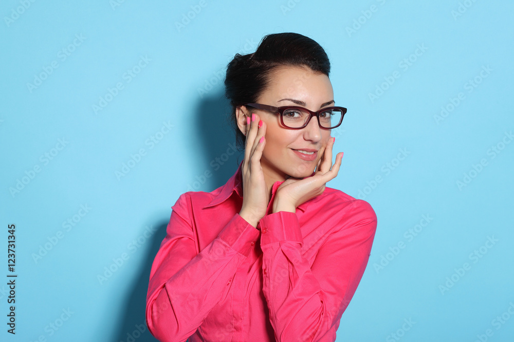 attractive cheerful young woman in glasses