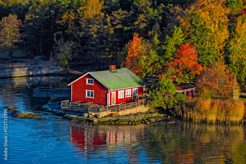 Red house on rocky shore of Ruissalo island, Finland
