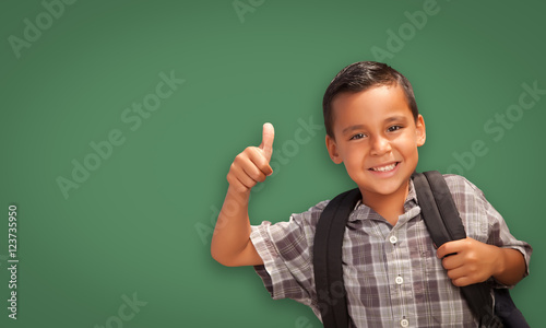 Cute Hispanic Boy with Thum...