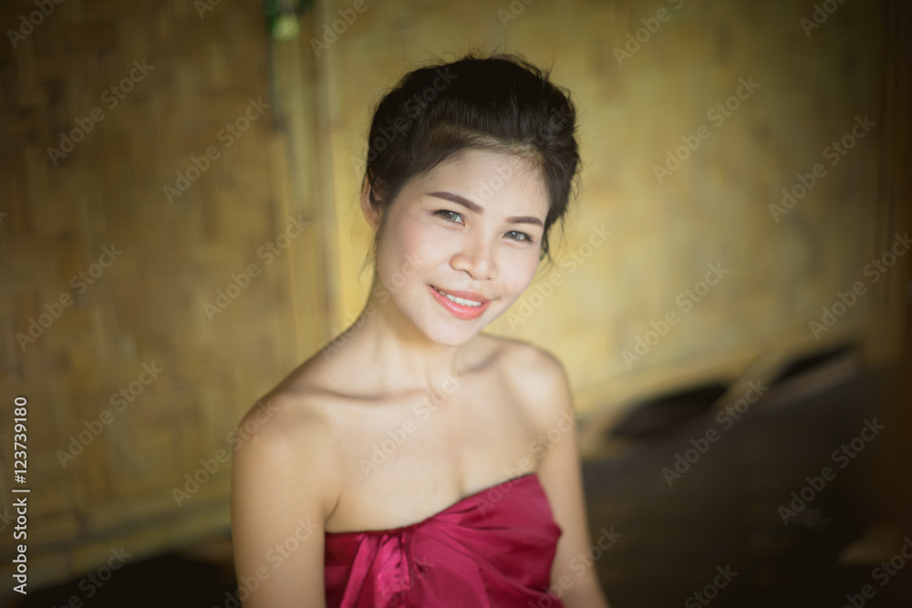 Thai girl in Thai traditional costume with vignette effect Thai girl in Thai traditional costume with vignette effect