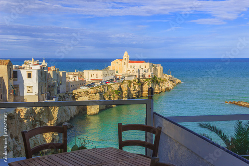 Summertime. Gargano coast: bay of Vieste.-(Apulia) ITALY-Panoramic view of the old city.