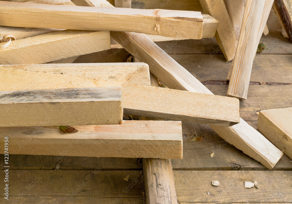 Fresh boards and wood shavings Fresh boards and wood shavings
