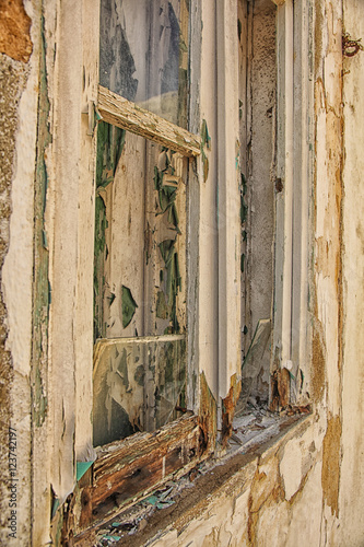 Weathered and chipped wooden windows photo