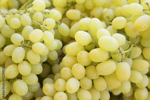 Grape. Wine grapes background.Green grapes. Grapes an market. It can be used as a food background (selective focus)