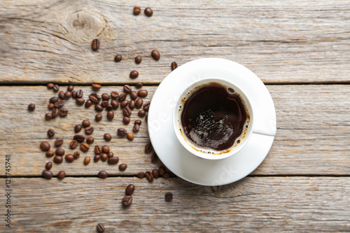 Cup of coffee on a grey wooden table