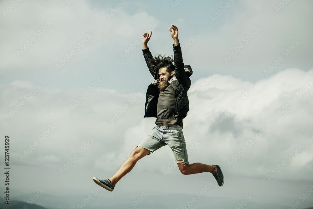 Man hipster jumps