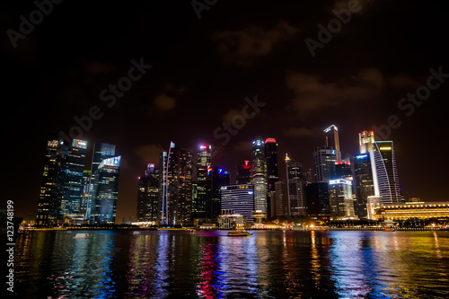 Singapore night lights shimmer on the banks of different colors