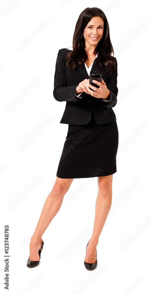 Full-length young businesswoman texting with mobile phone isolated on white background Full-length young businesswoman texting with mobile phone isolated on white background