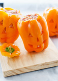 Halloween jack-o-lanterns filled with minced meat