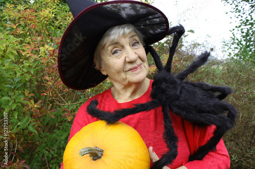 old woman with a pumpkin