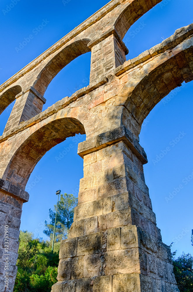 Bottom detailed view on roman aqueduct near Tarragona, Spain