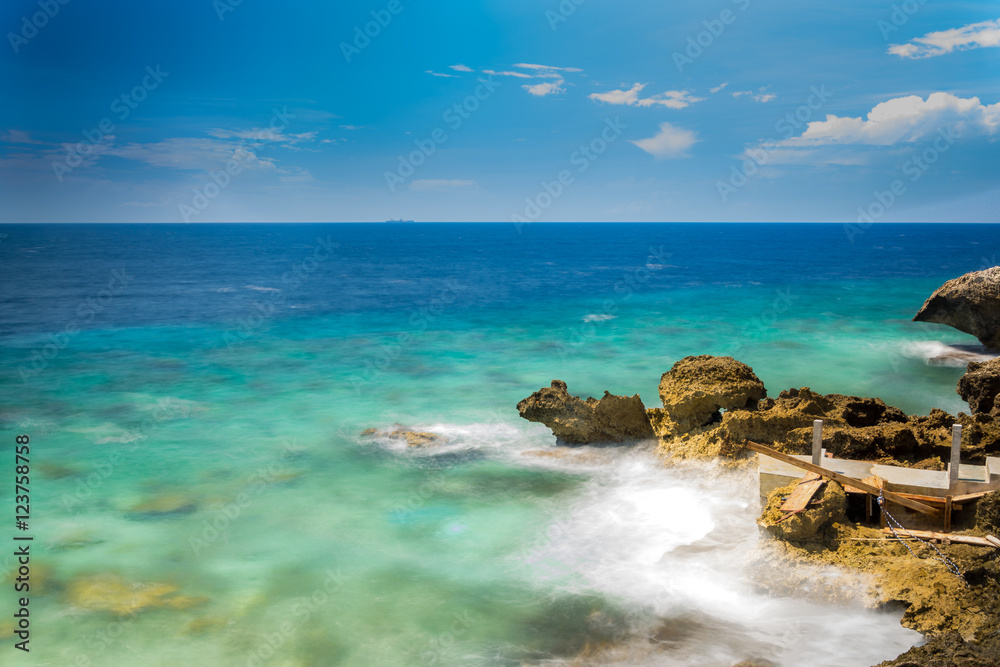 Seascape in curacao, caribbean sea, with rocks and stairs Seascape in curacao, caribbean sea, with rocks and stairs