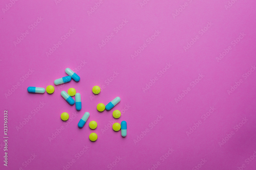 Pills and drugs on pink background Pills and drugs on pink background