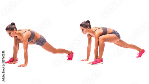 Plank Lunge with Push-up.Young woman doing sport exercise.
