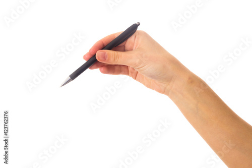 Woman's hand holding a pen