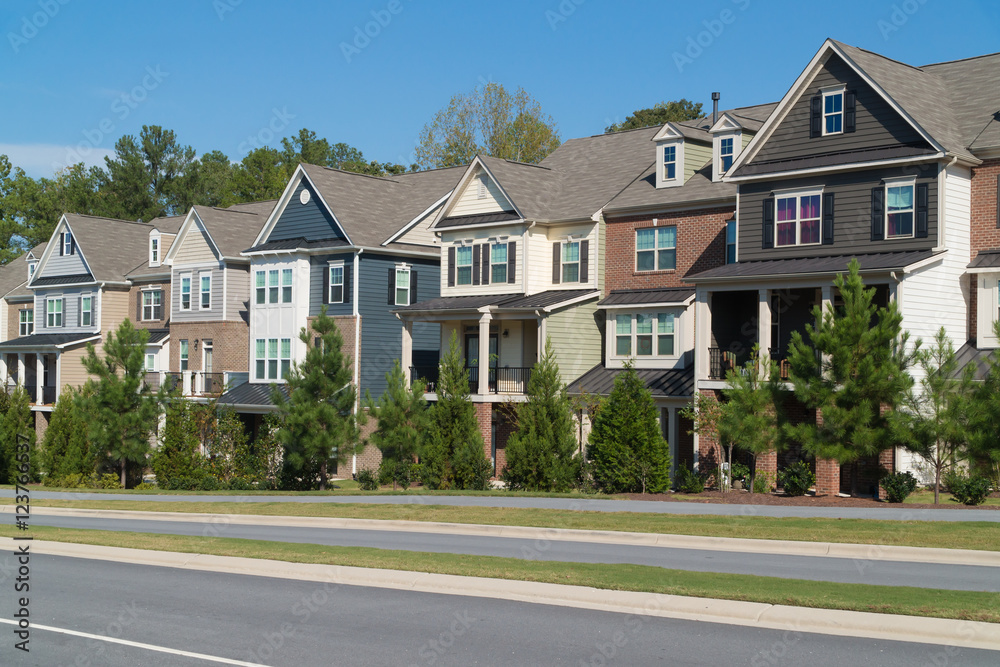 Row of town homes along a parkway Row of town homes along a parkway