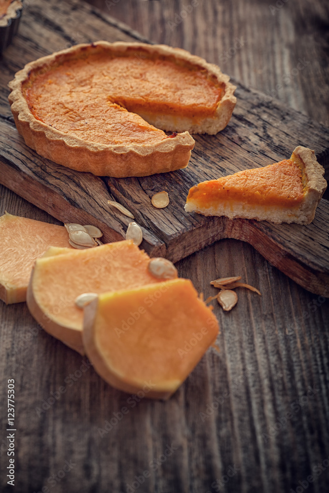 Thanksgiving pumpkin pie on wooden background with copy space Thanksgiving pumpkin pie on wooden background with copy space