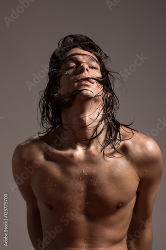 Fashion photography nude body young man model wet long hair Stock Photo |  Adobe Stock